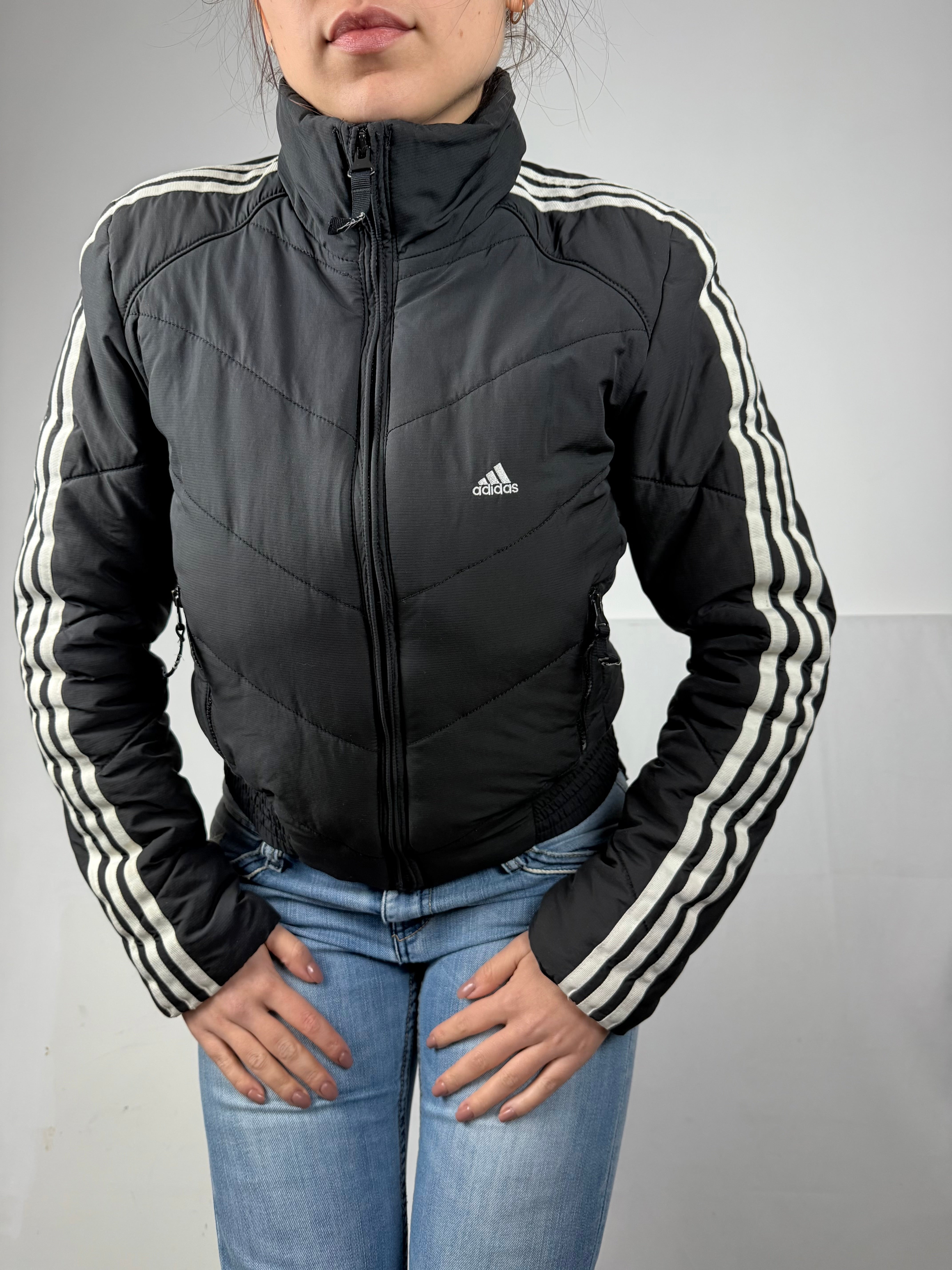 Black zip up puffer jacket (L)