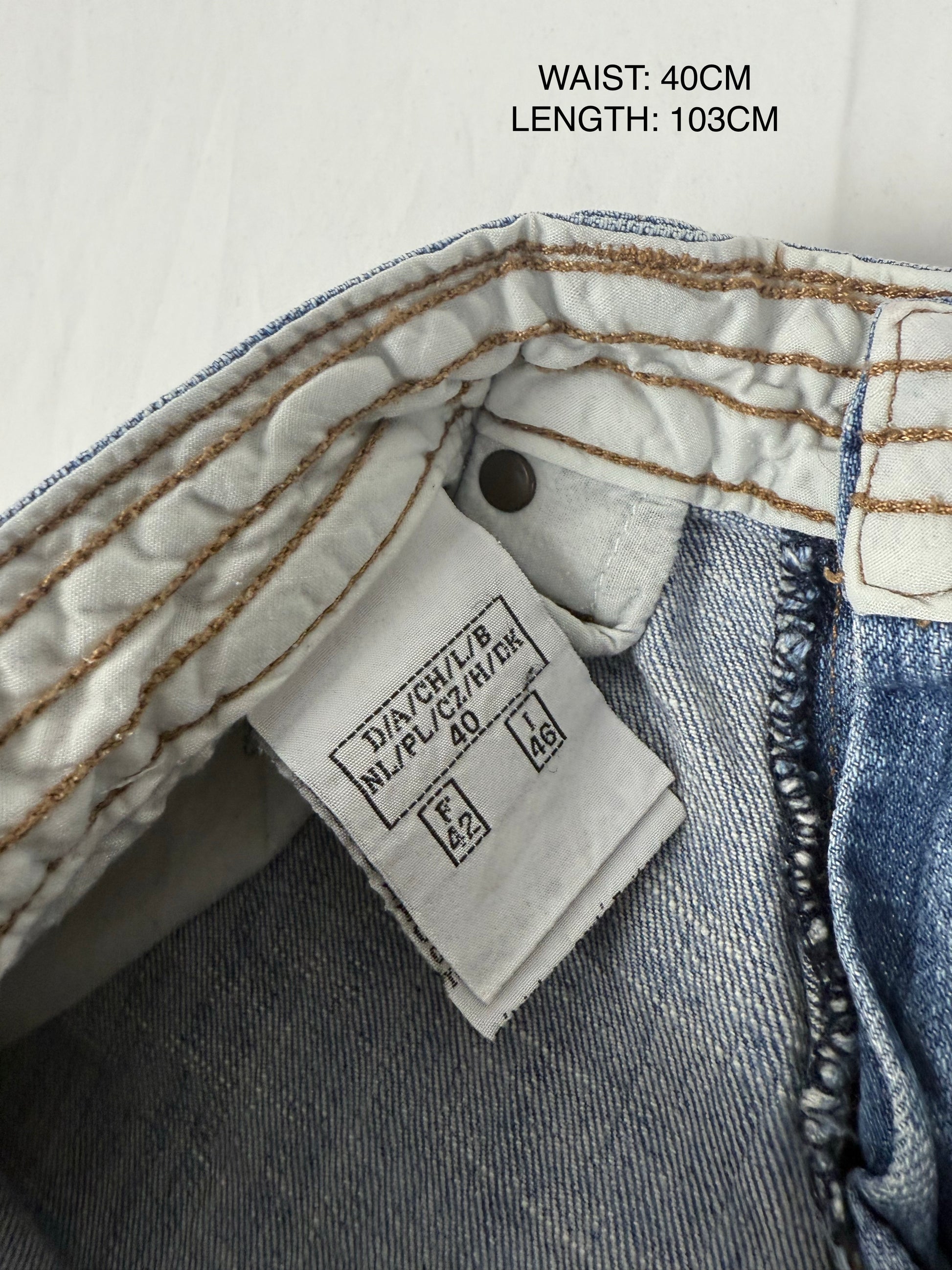 Blue denim low rise flared pants (M)