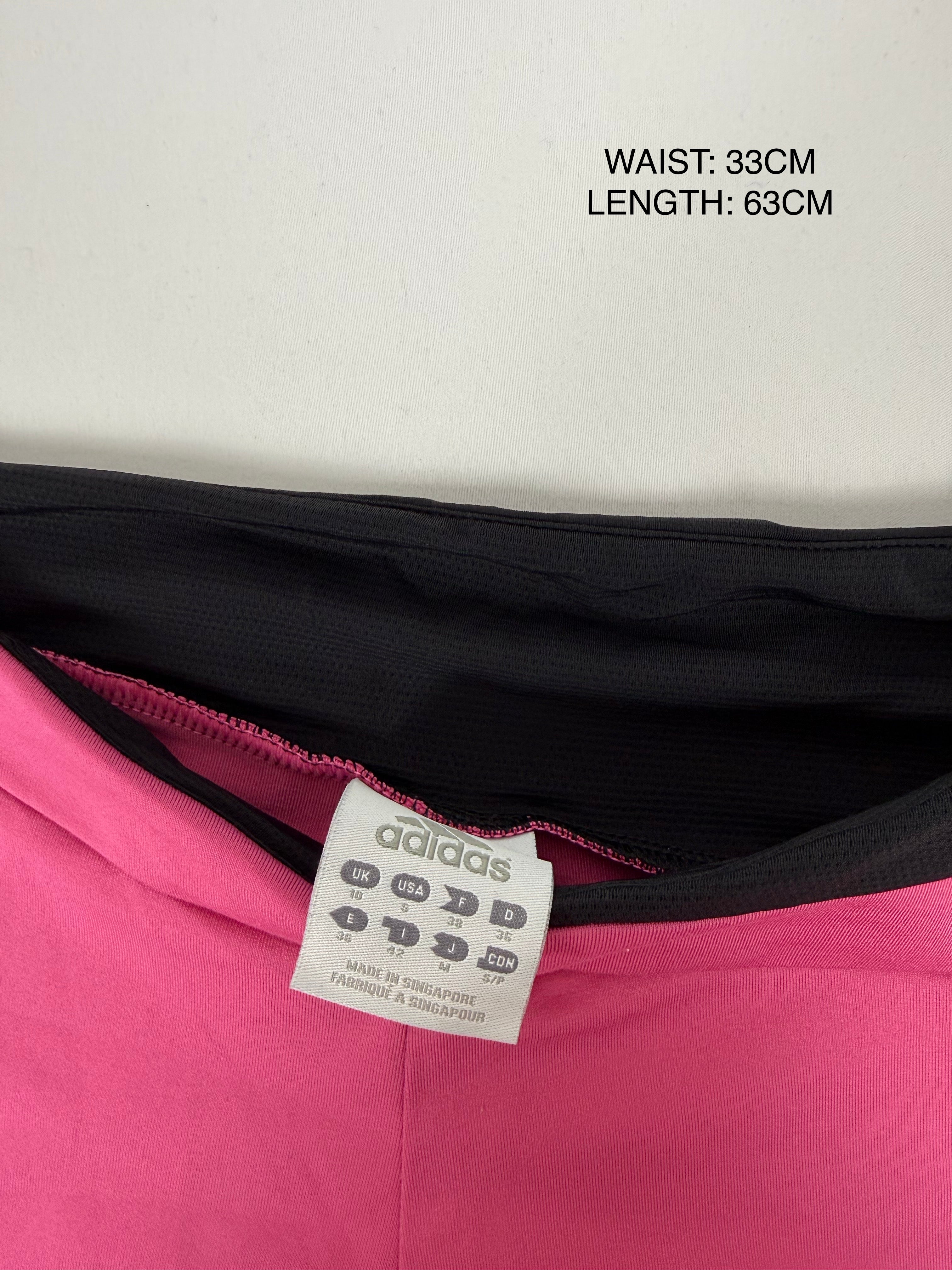 Pink stretchy low rise capri pants (M)