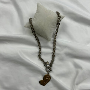 Gold heart pendent necklace