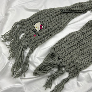 Grey knitted scarf