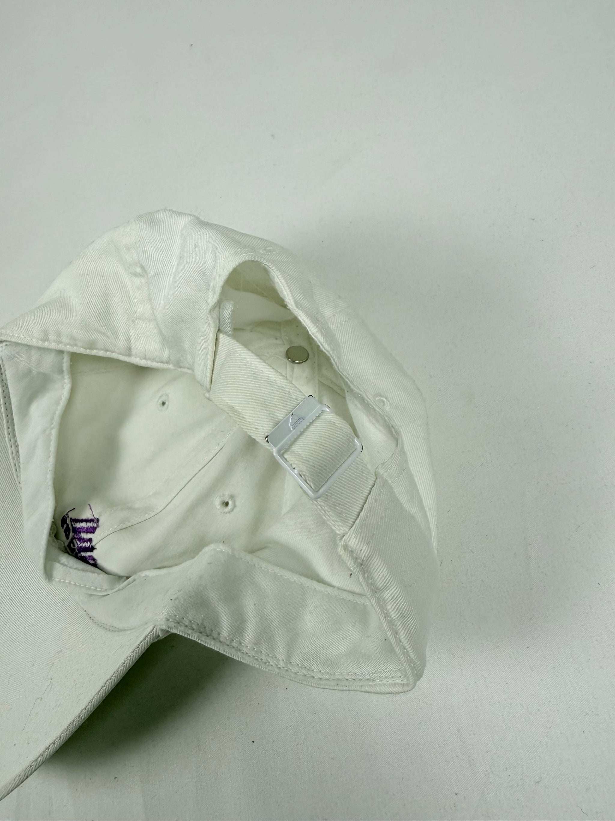 White & purple logo cap