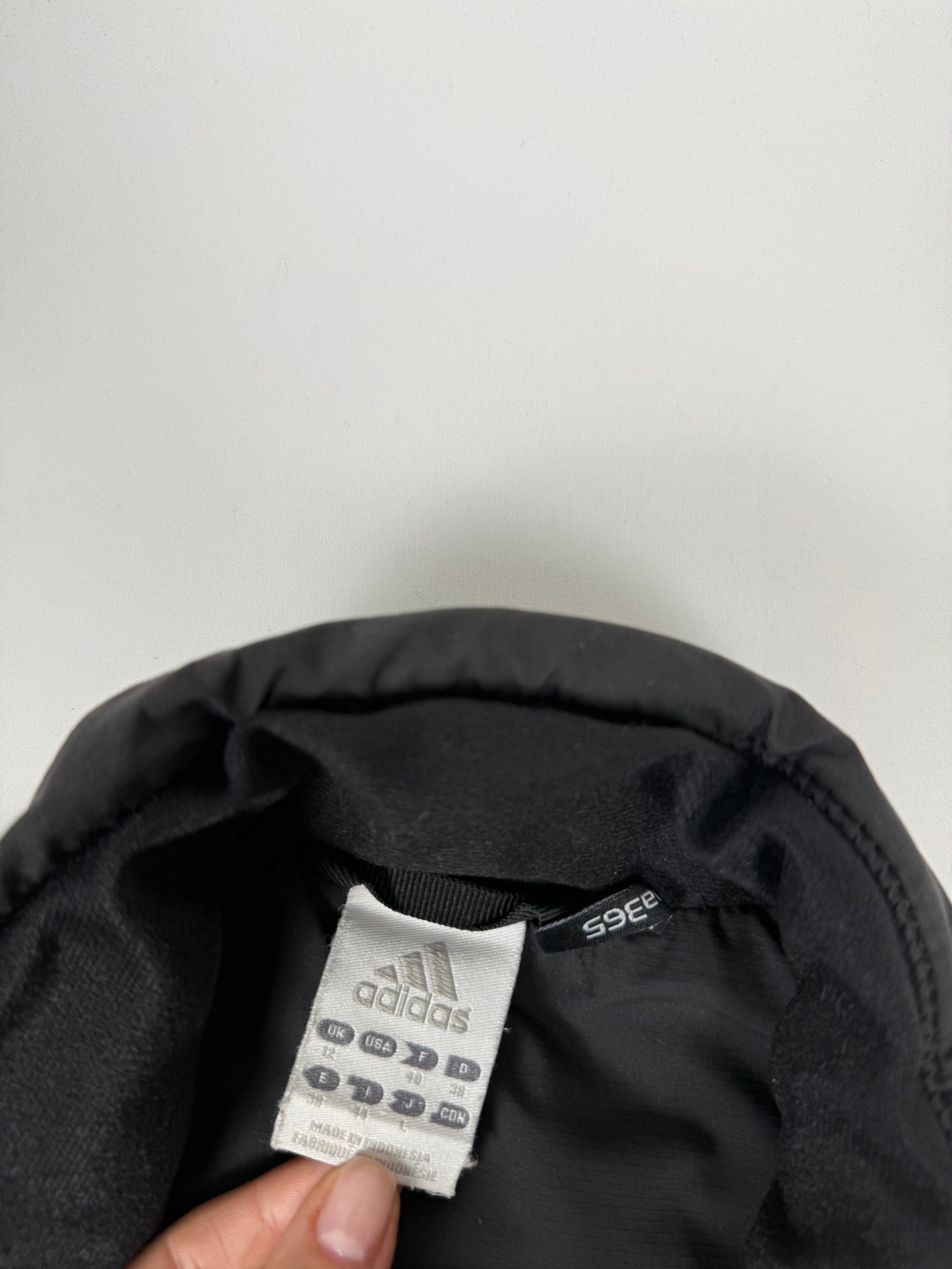 Black zip up puffer jacket (L)