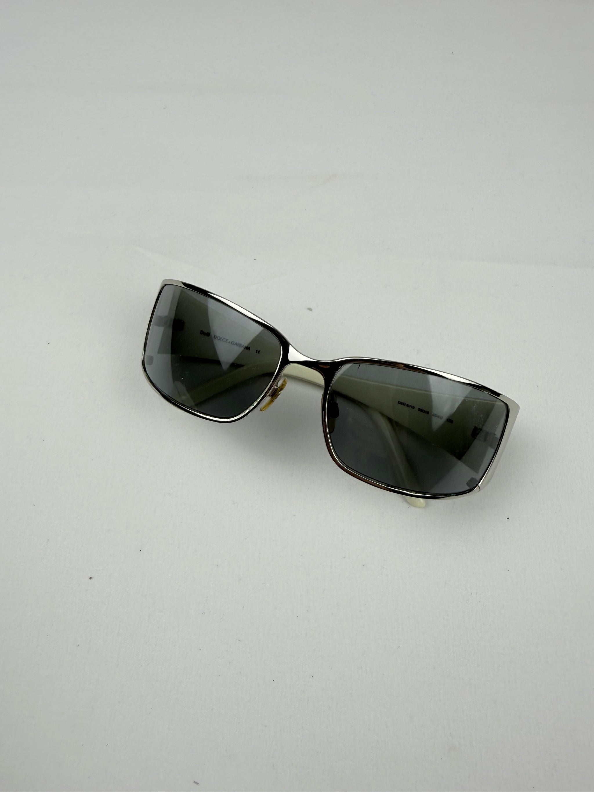White & silver logo sunglasses