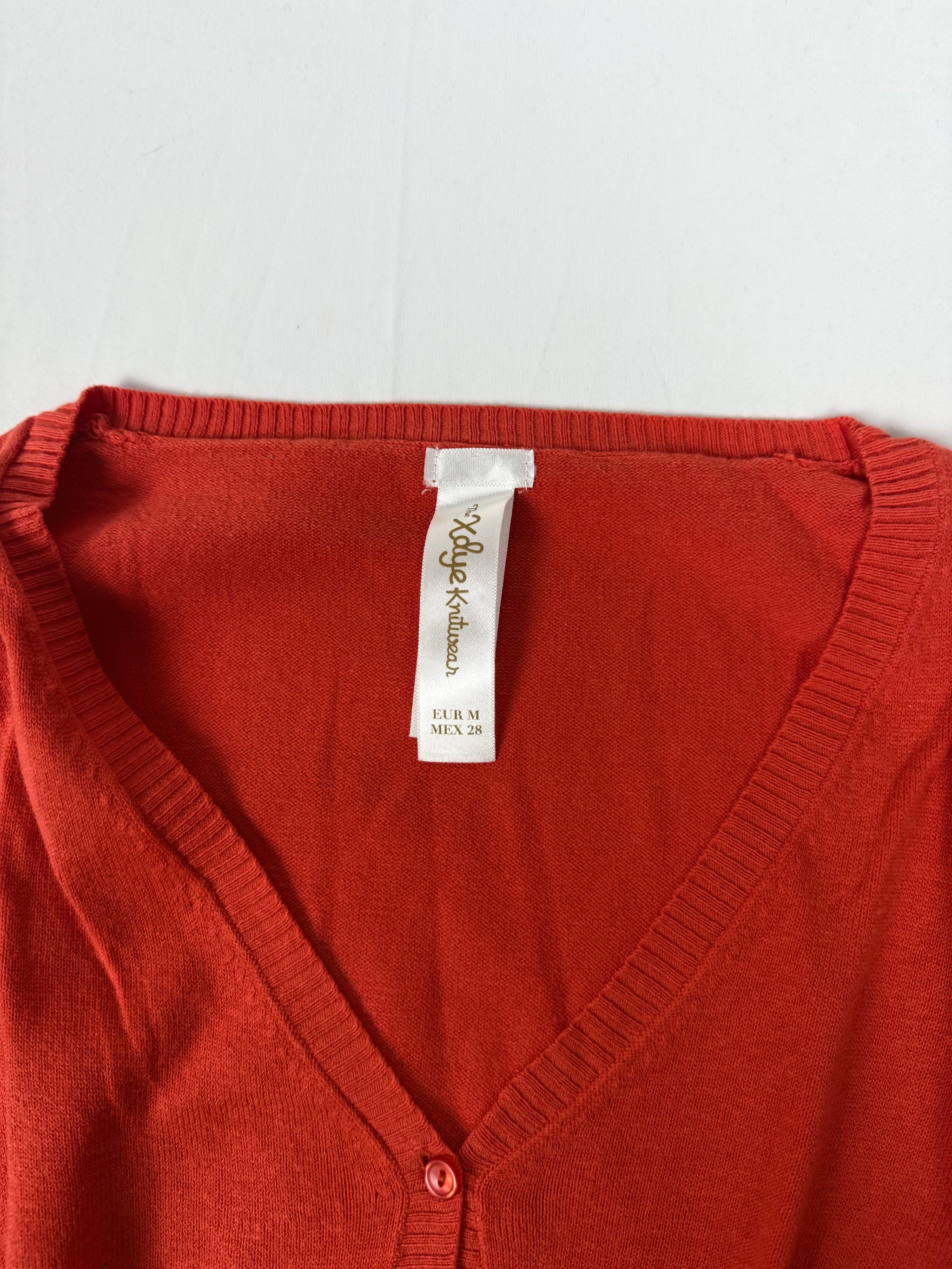 Orange ribbed tight fit jumper (M)