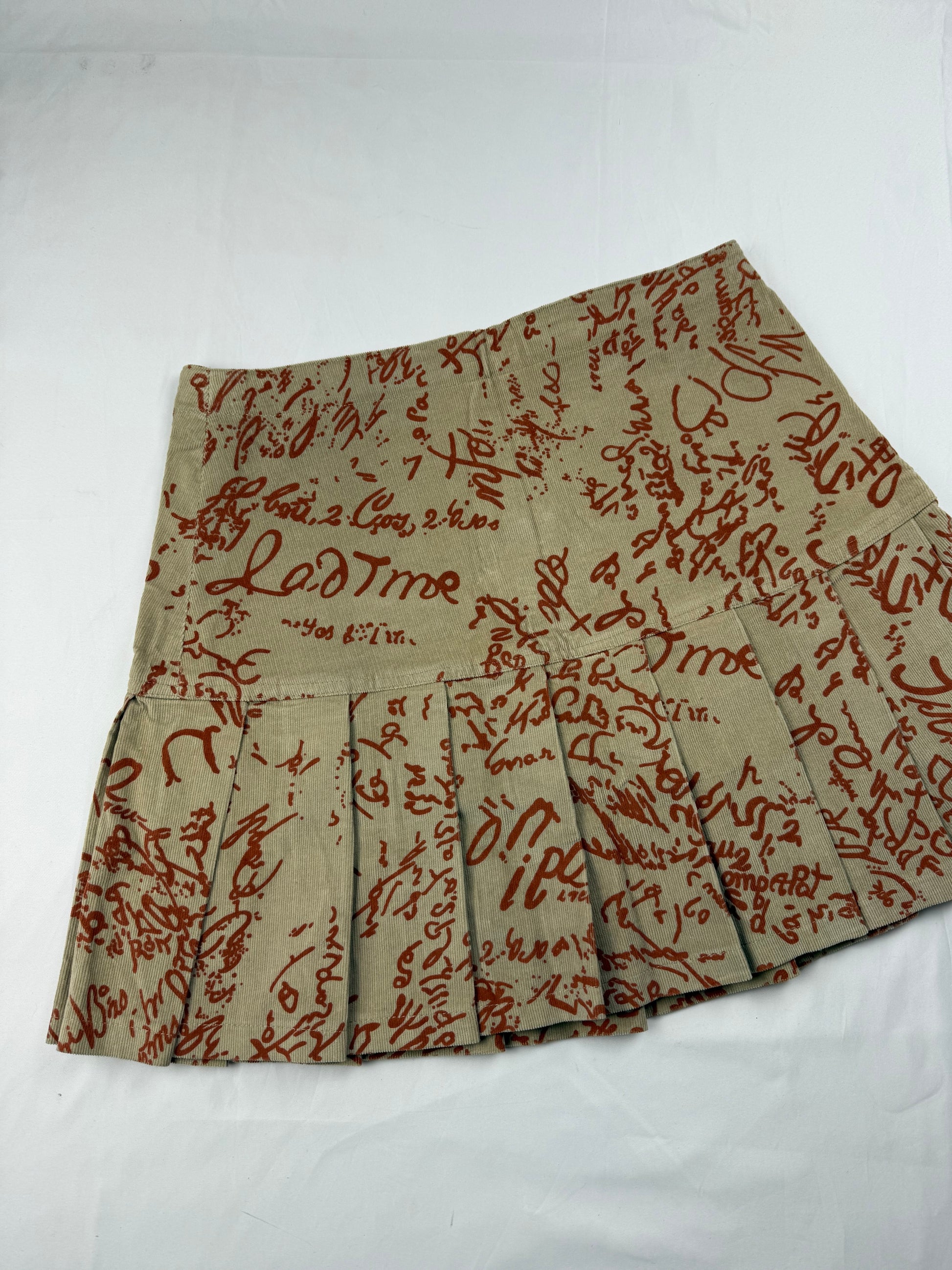 Beige graphic denim velvet pleated mini skirt (S/M)