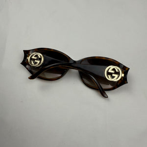 Brown 2000s gold logo sunglasses