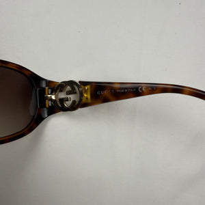 Brown 2000s gold logo sunglasses