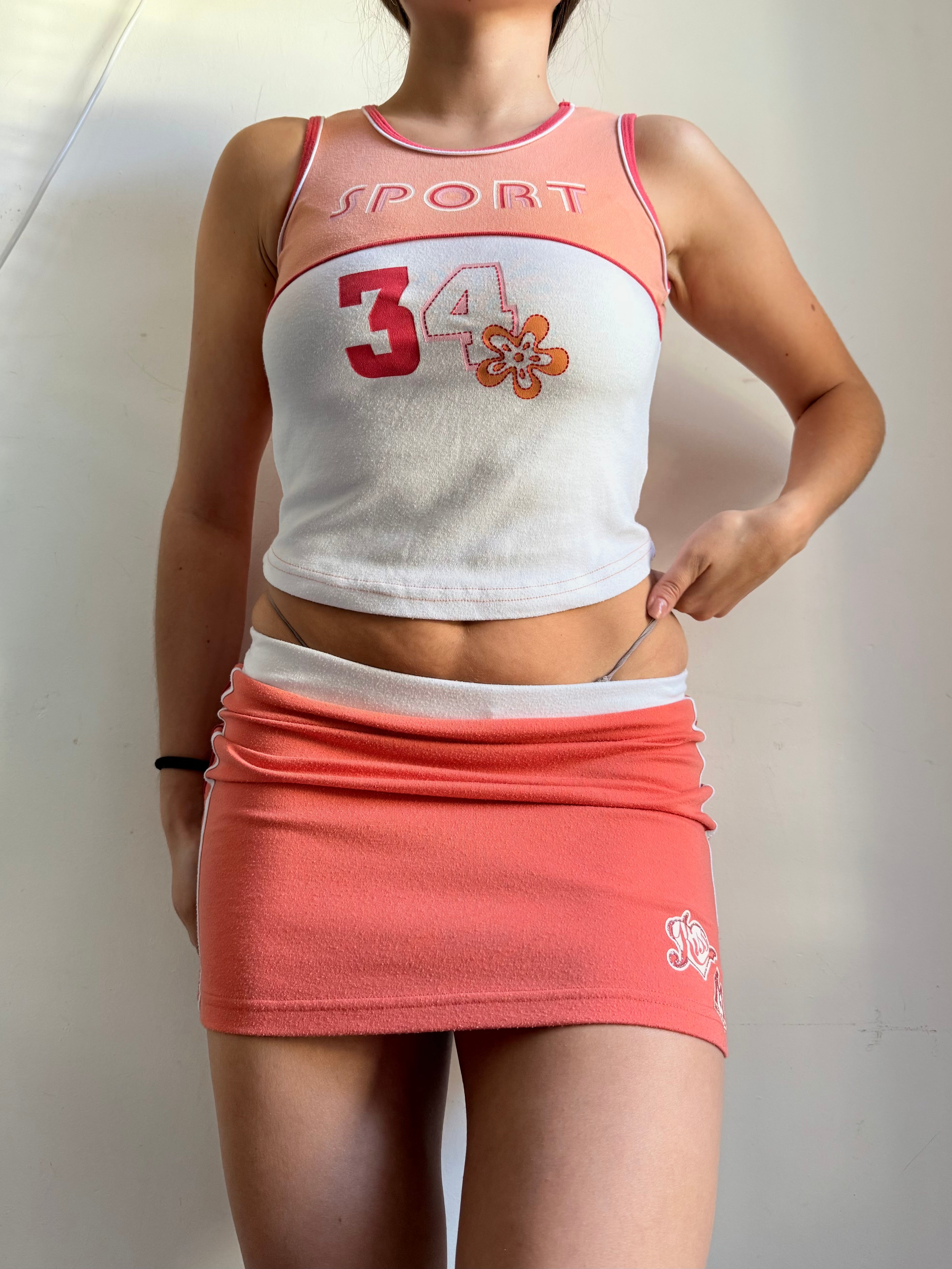 Orange activewear mini skirt + top set (XS/S)