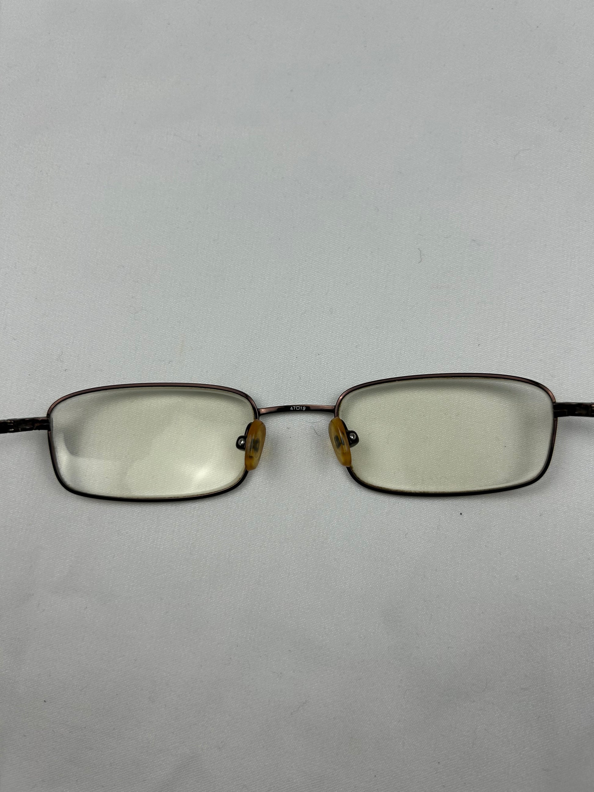 2000s office siren glasses (with prescription)