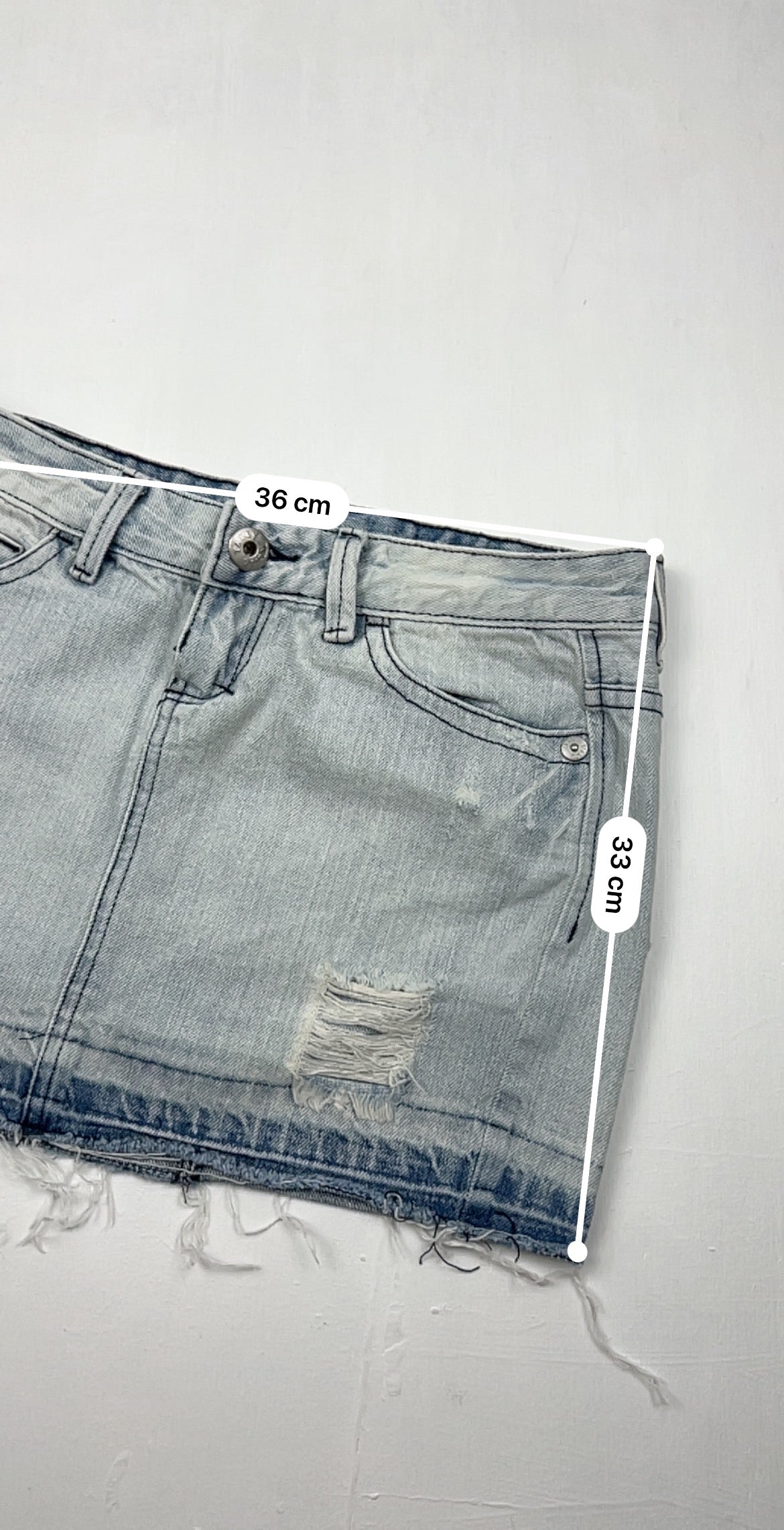 Blue denim low rise mini skirt (XS)