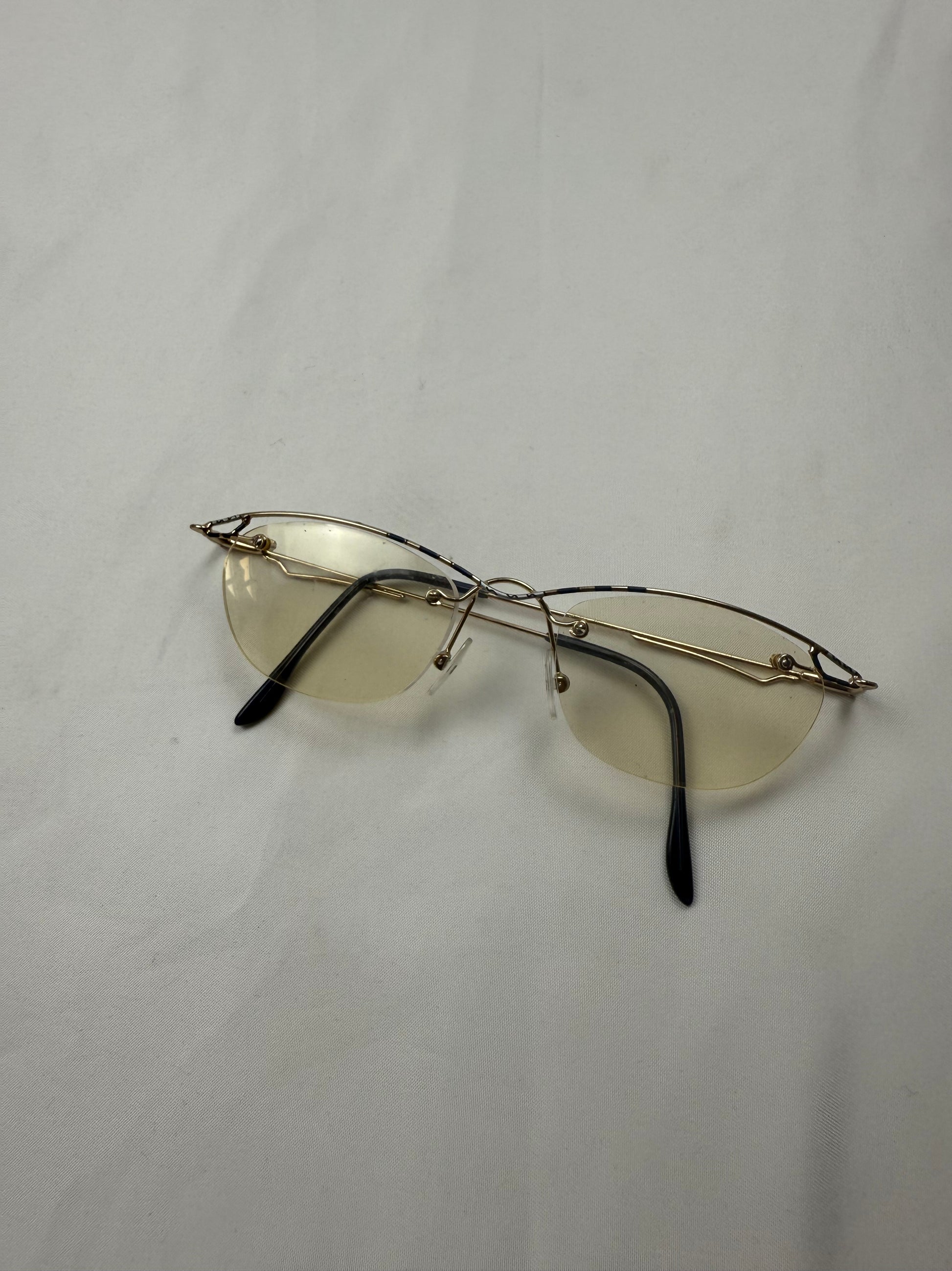 2000s office siren glasses (with prescription)