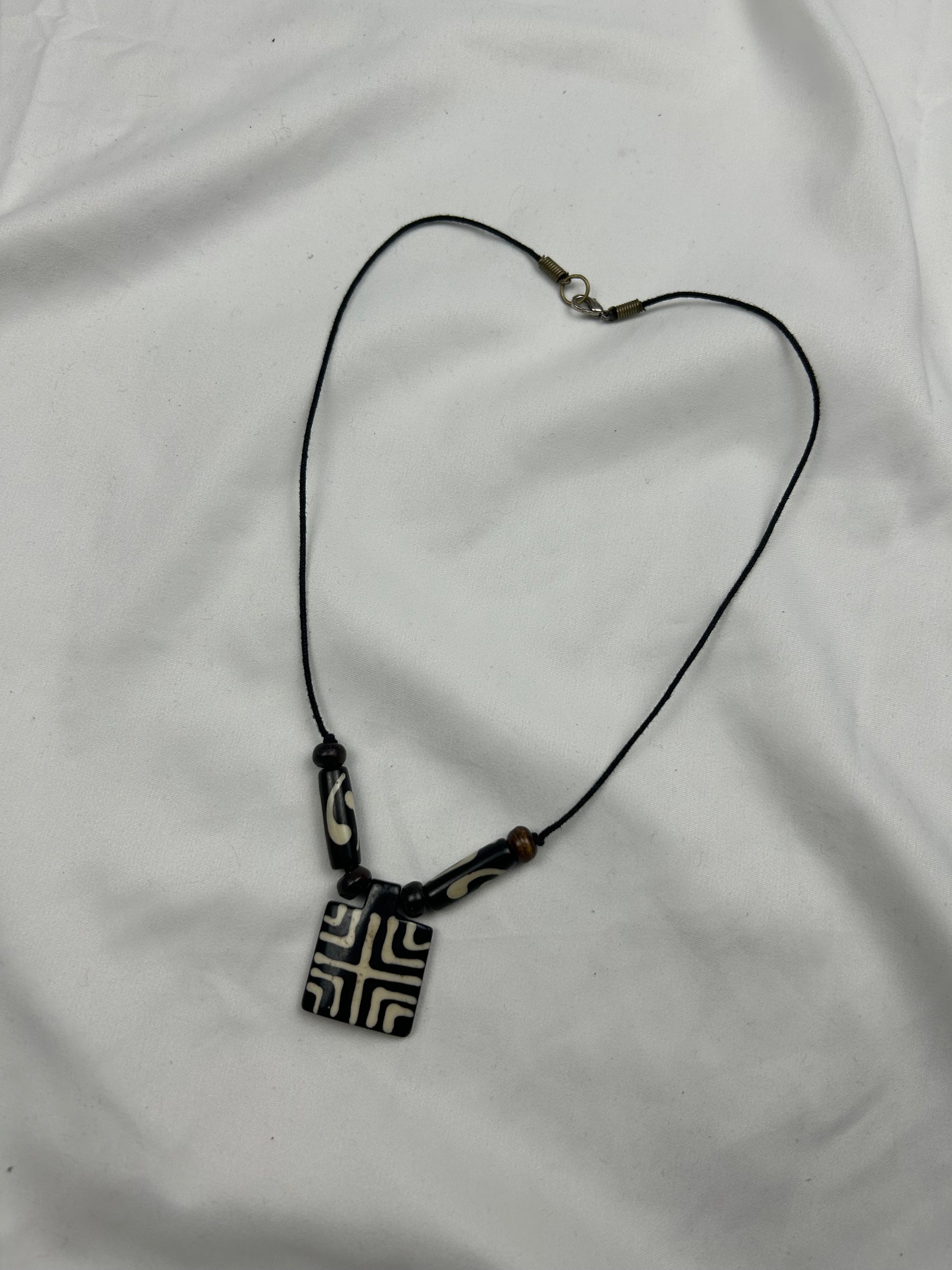 Black pearls boho cord necklace