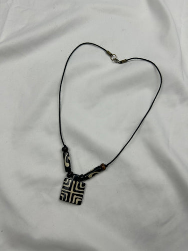 Black pearls boho cord necklace