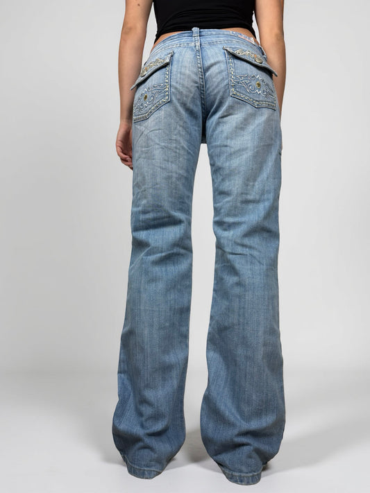 Blue denim low rise flared pants (M)