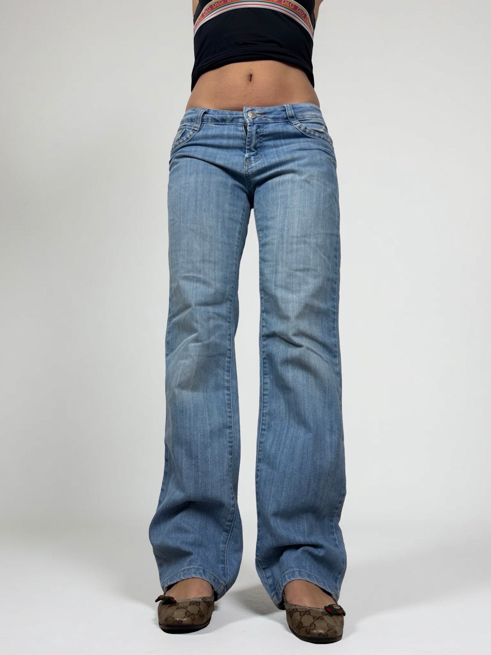 Blue denim low rise flared pants (M)