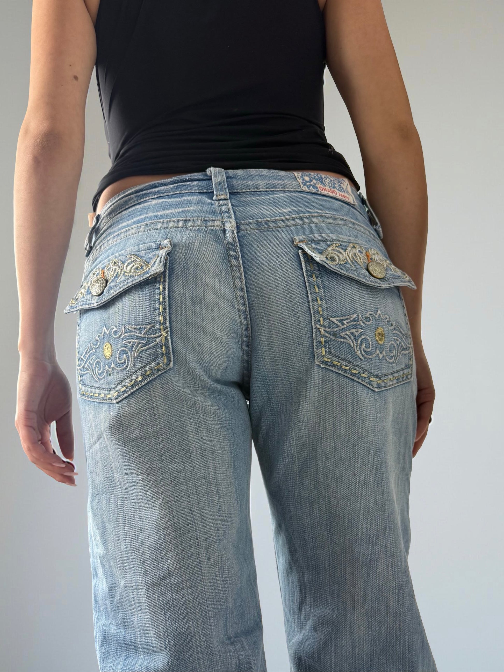 Blue denim low rise flared pants (M)