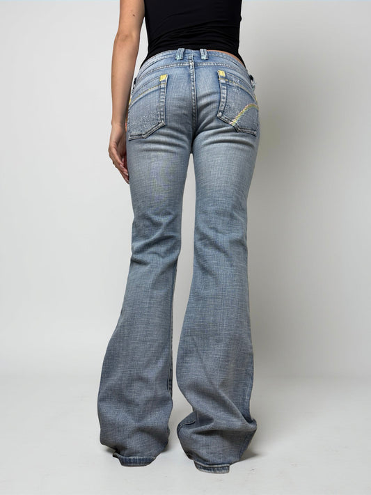 Blue denim low rise flared pants (M)